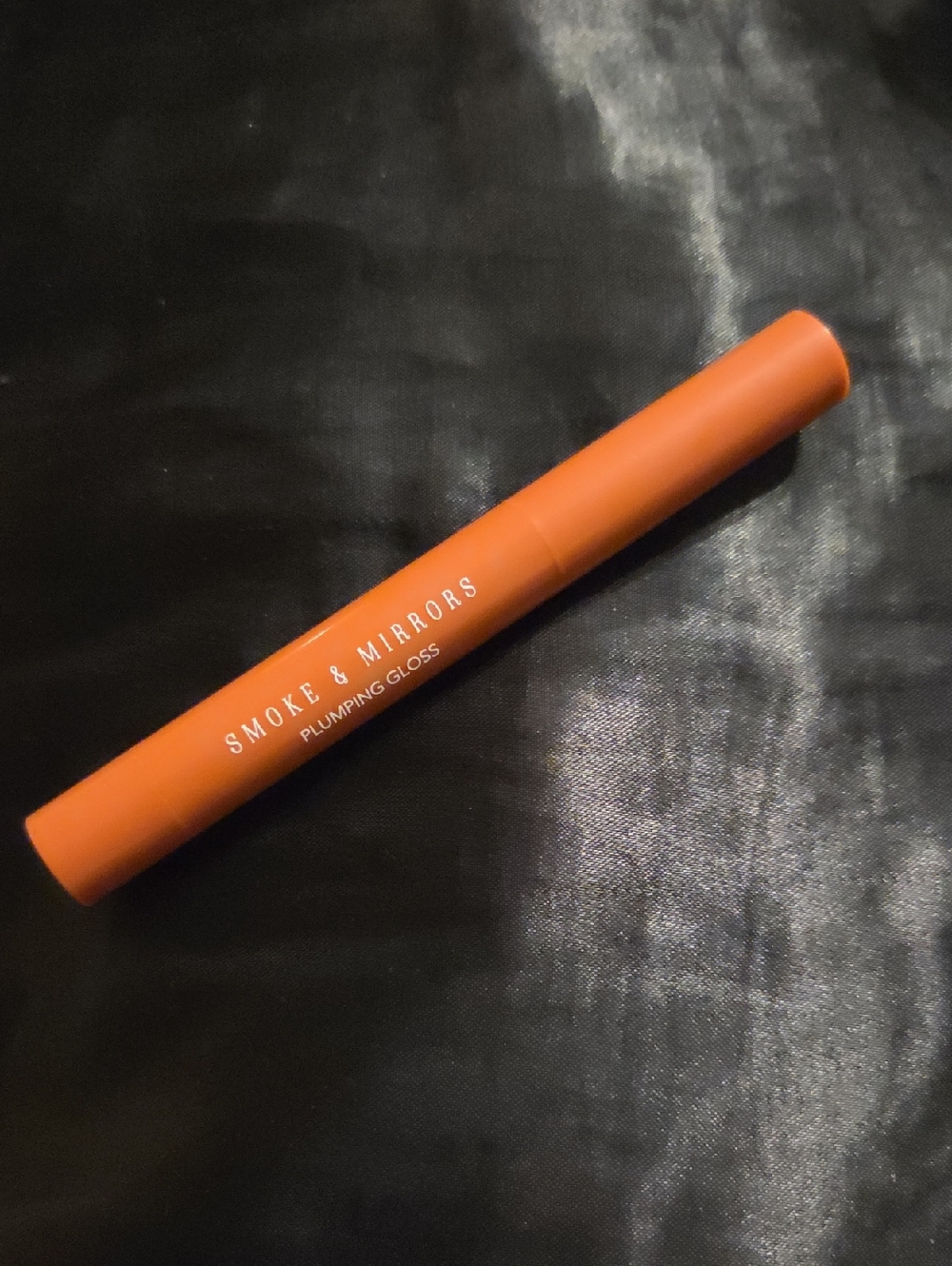 Smoke and mirrors Tan plumping gloss